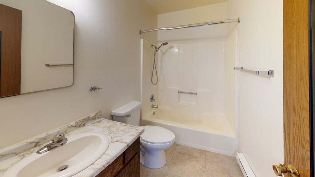 full bathroom with single sink vanity